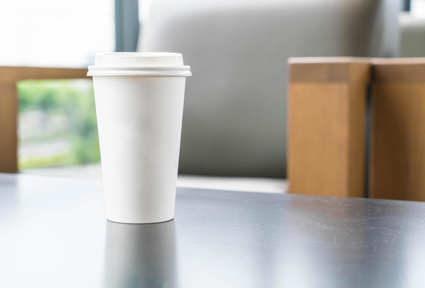 Coffee cup with copy space on a table photo