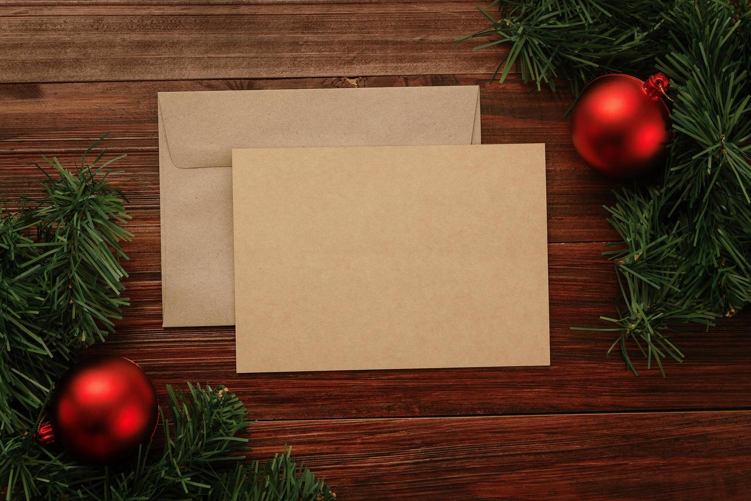 Merry Christmas greeting card and envelope mockup photo