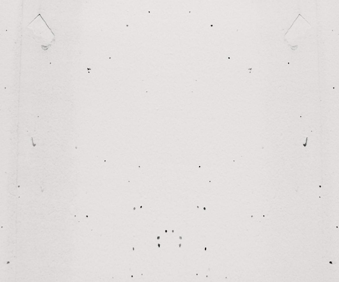 Dots on concrete wall texture photo