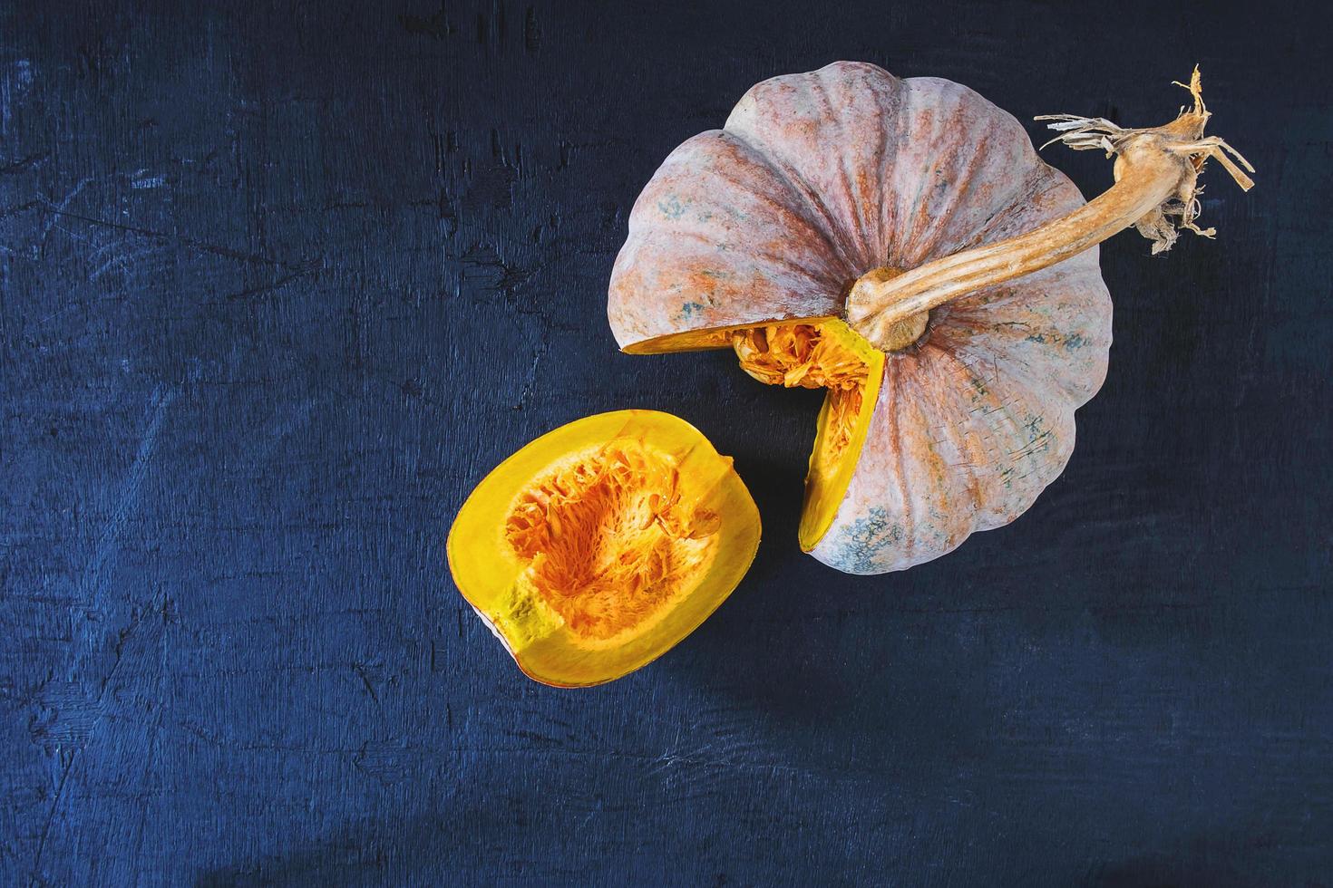 Vegetable pumpkin on a wooden table photo