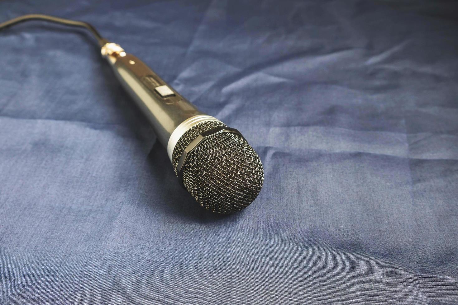 Microphone on a shiny cloth photo
