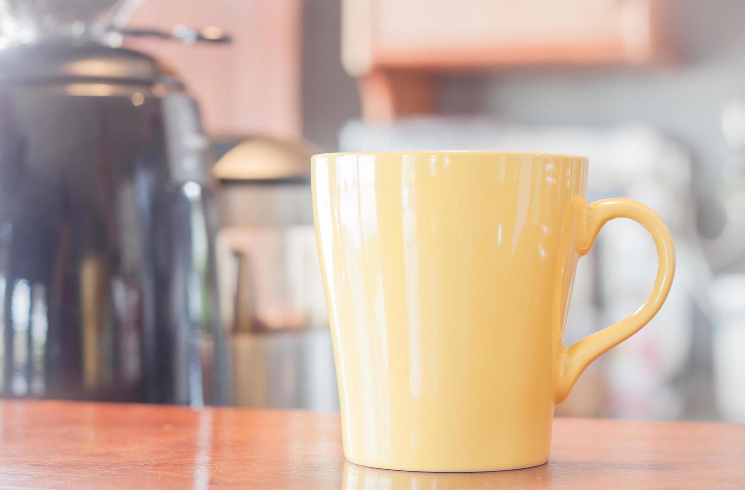 Yellow coffee mug photo