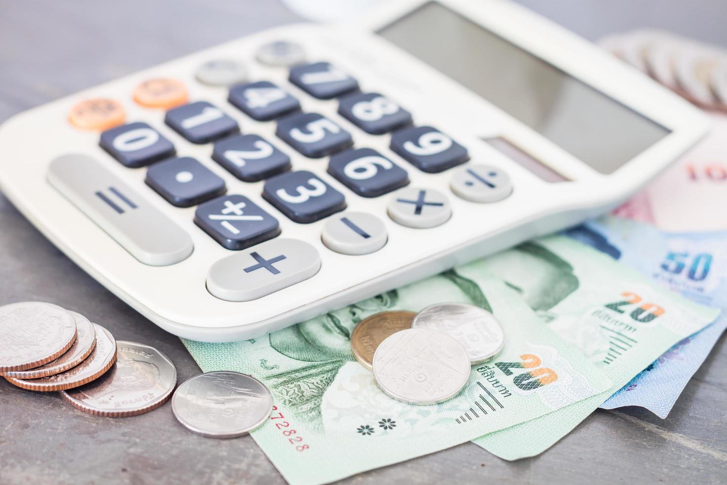 Close-up of calculator and money photo