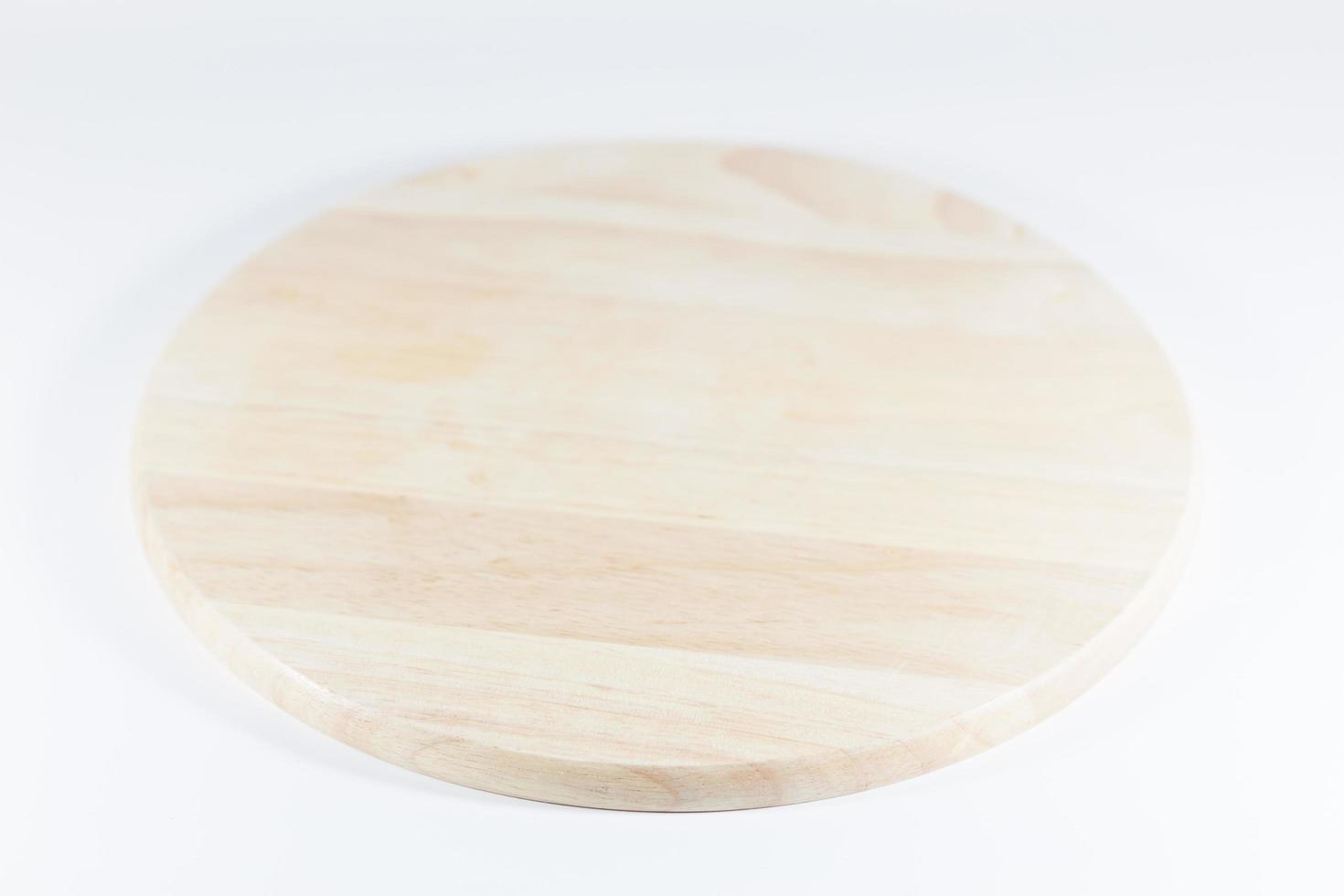 Wooden tray isolated on a white background photo
