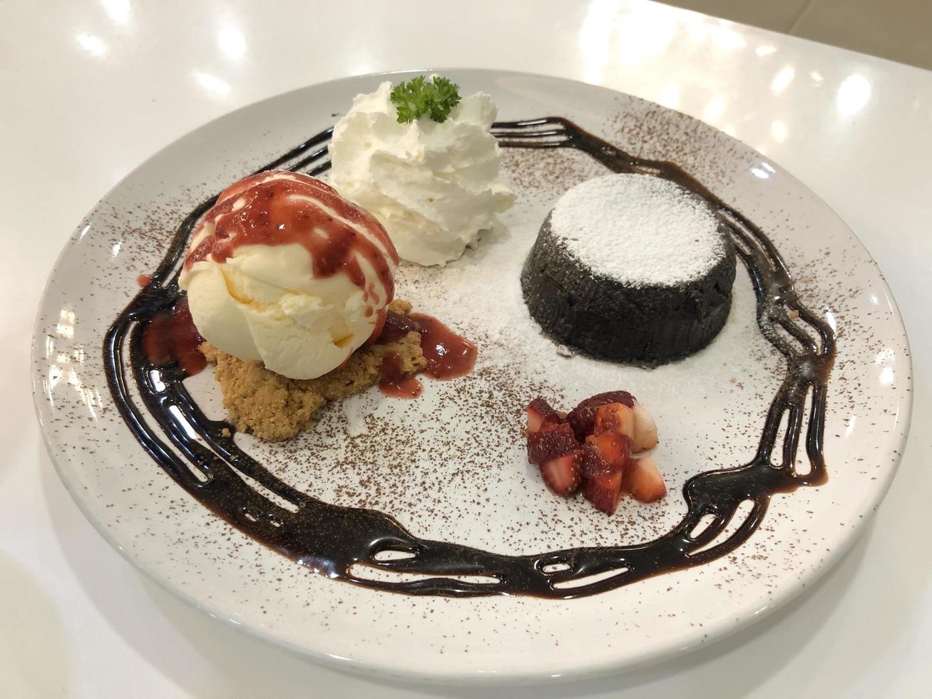 Chocolate lava cake with vanilla ice cream photo