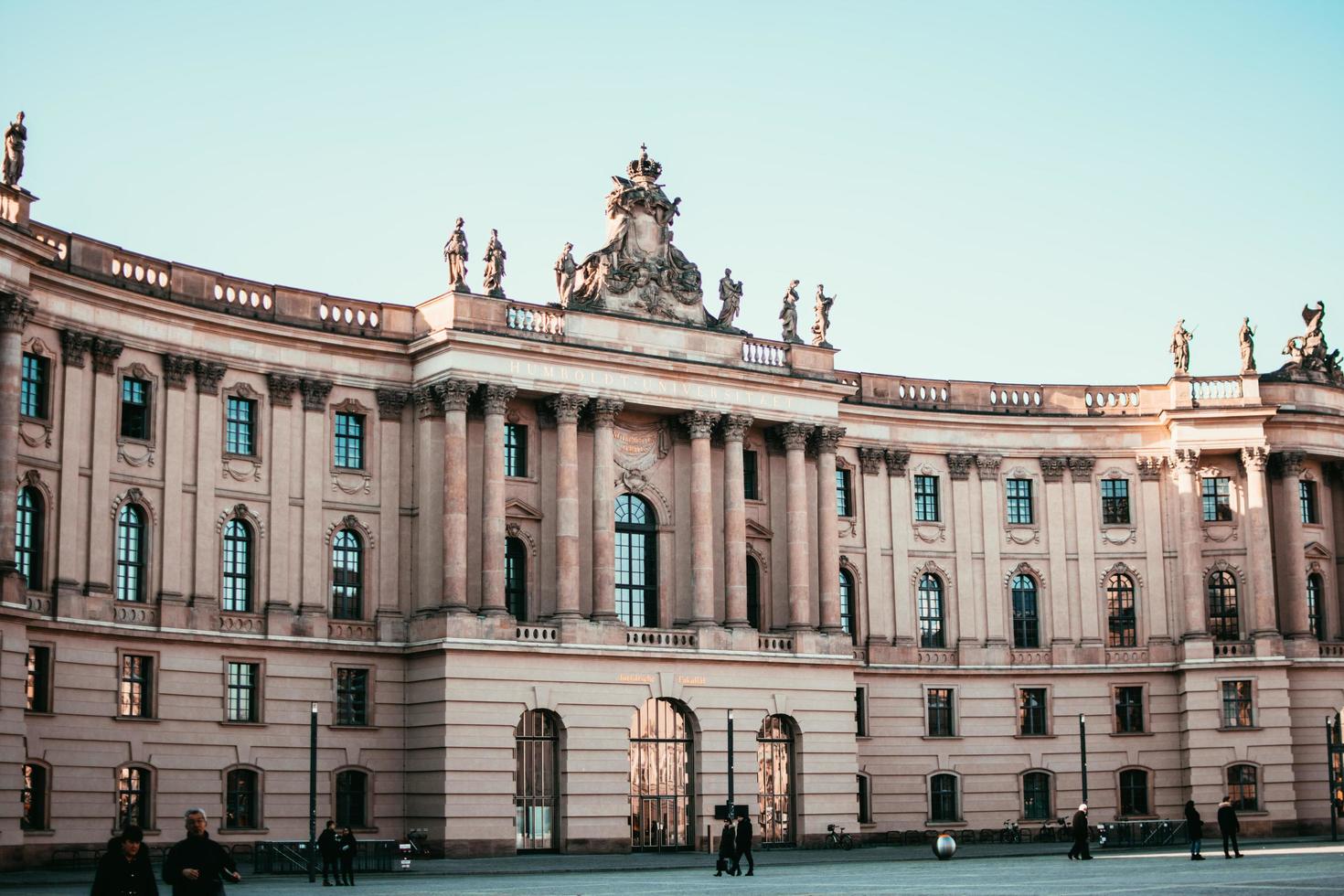 Berlin, Germany 2019- Pedestrians walk the campus of Humboldt University in Berlin photo