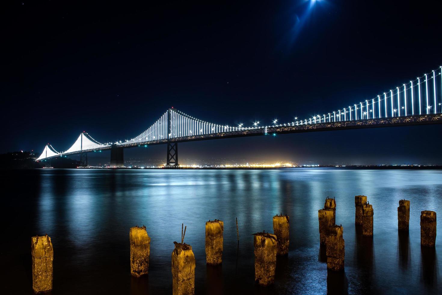 Time-lapse of water and city lights photo