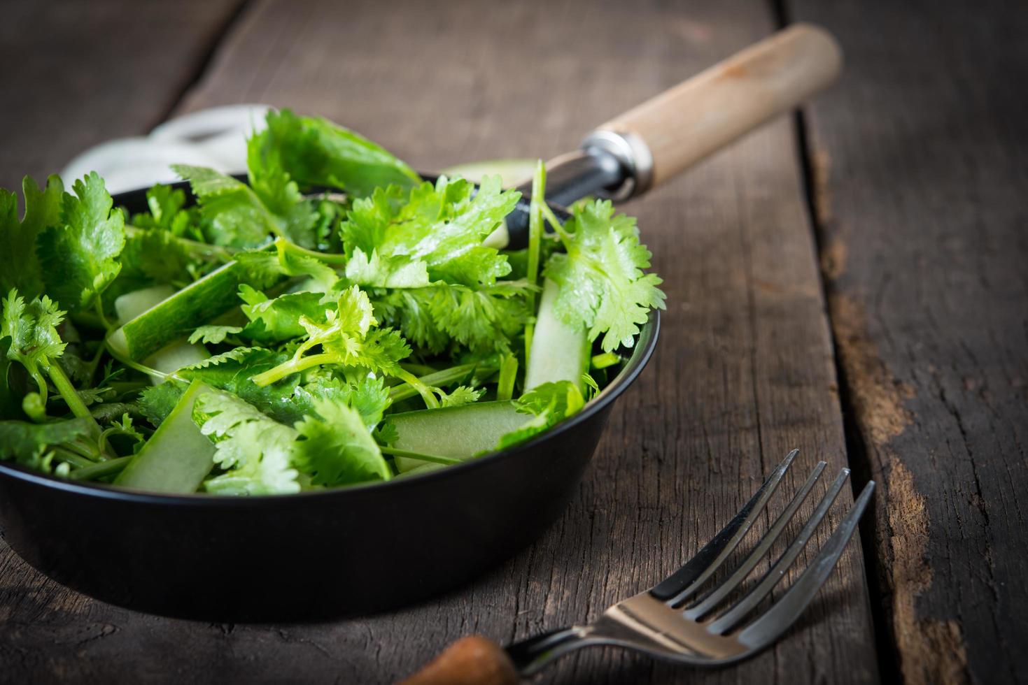 Fresh cilantro with cucumber and onion photo