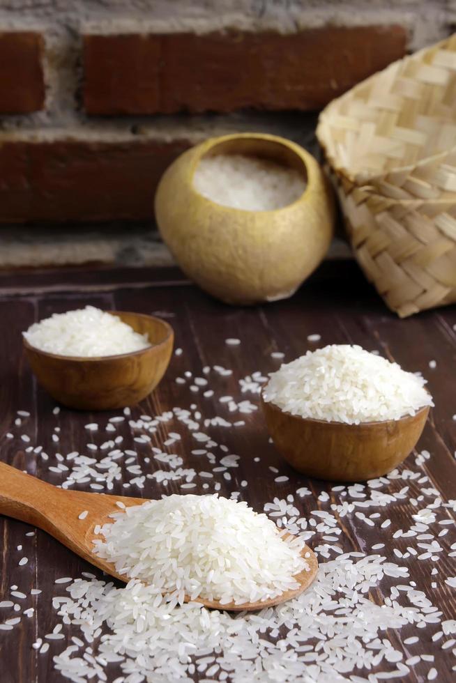 Rice on wooden table photo
