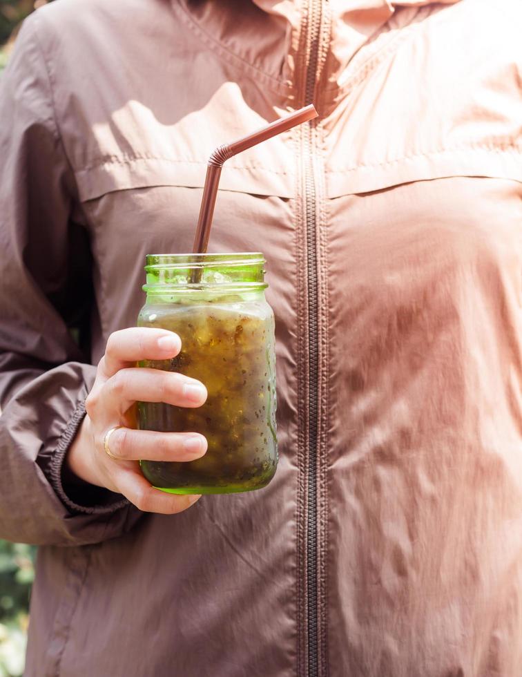 Person holding a soda photo