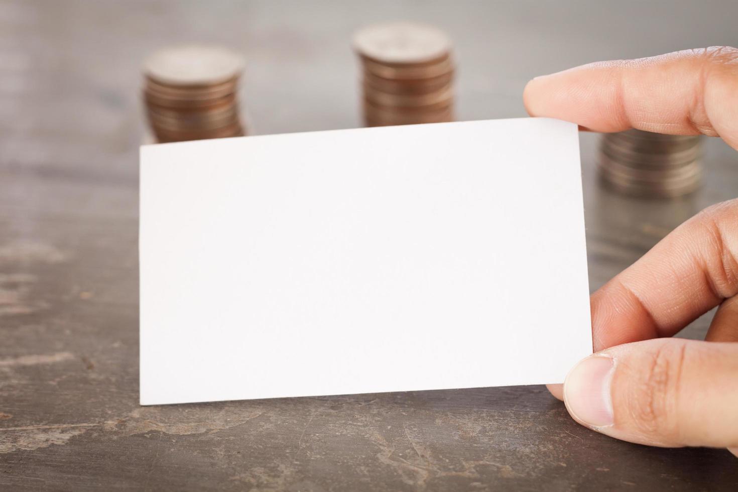 Close-up of a hand holding a blank card photo