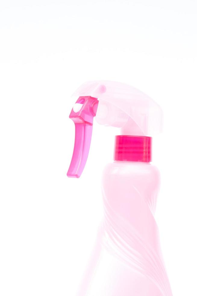 Plastic spray bottle on a white background photo