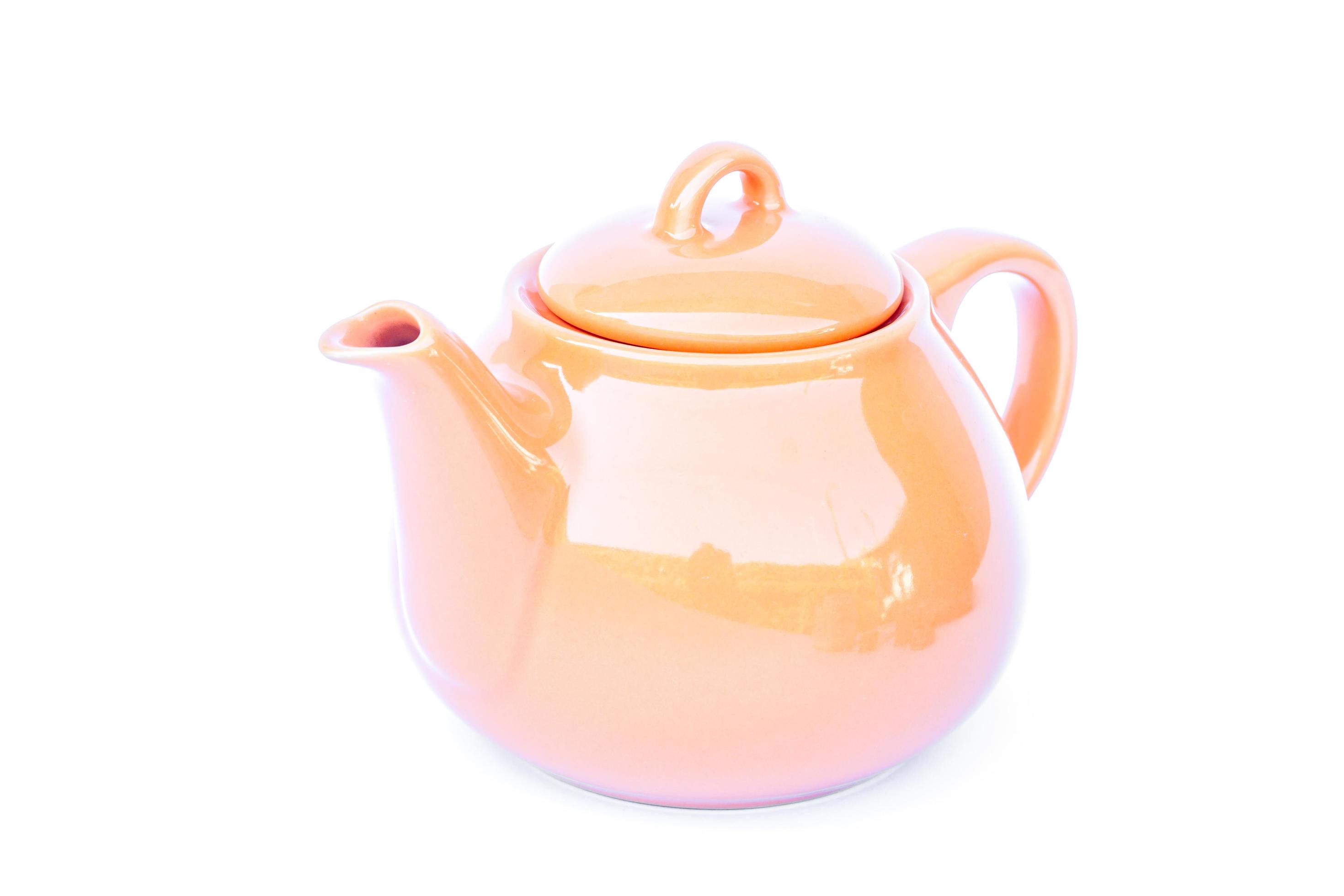 Orange teapot on a white background 1782206 Stock Photo at Vecteezy