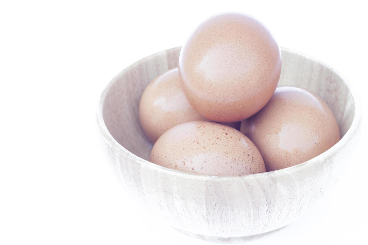 Close-up of eggs in a bowl photo