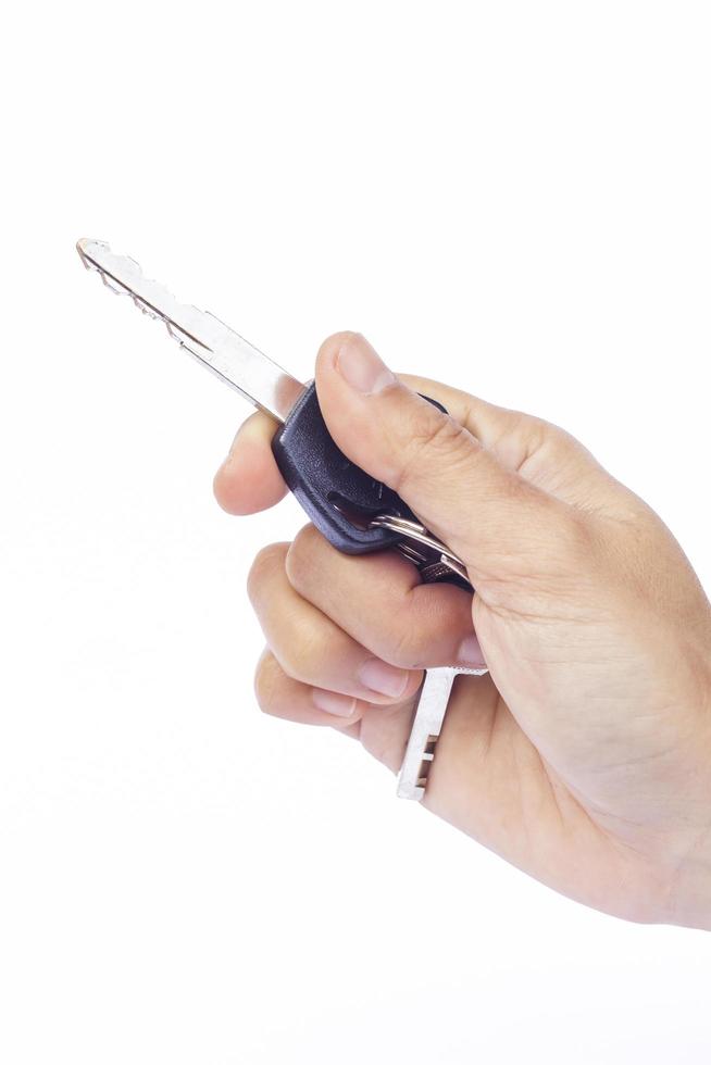 Hand with a car key photo