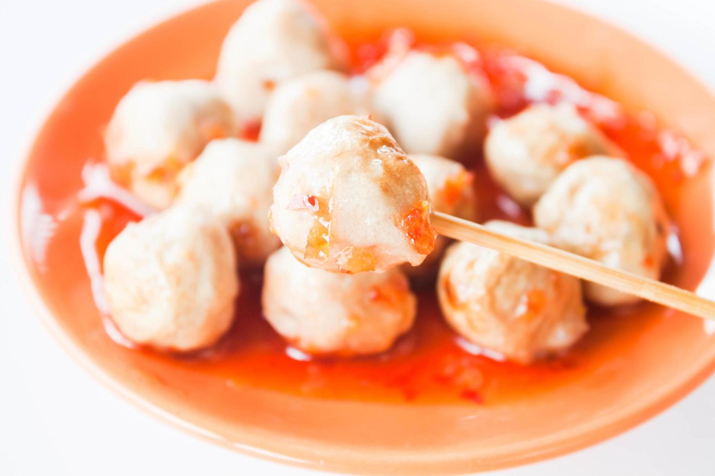 Pork meatballs in sauce on a plate photo