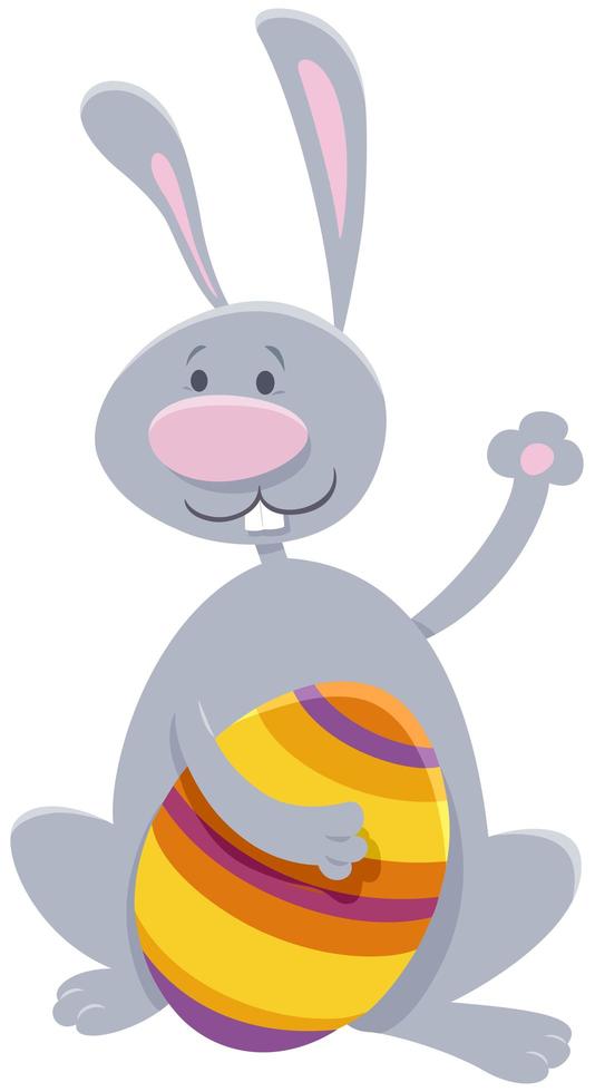 Cartoon Easter bunny with colorful Easter egg vector
