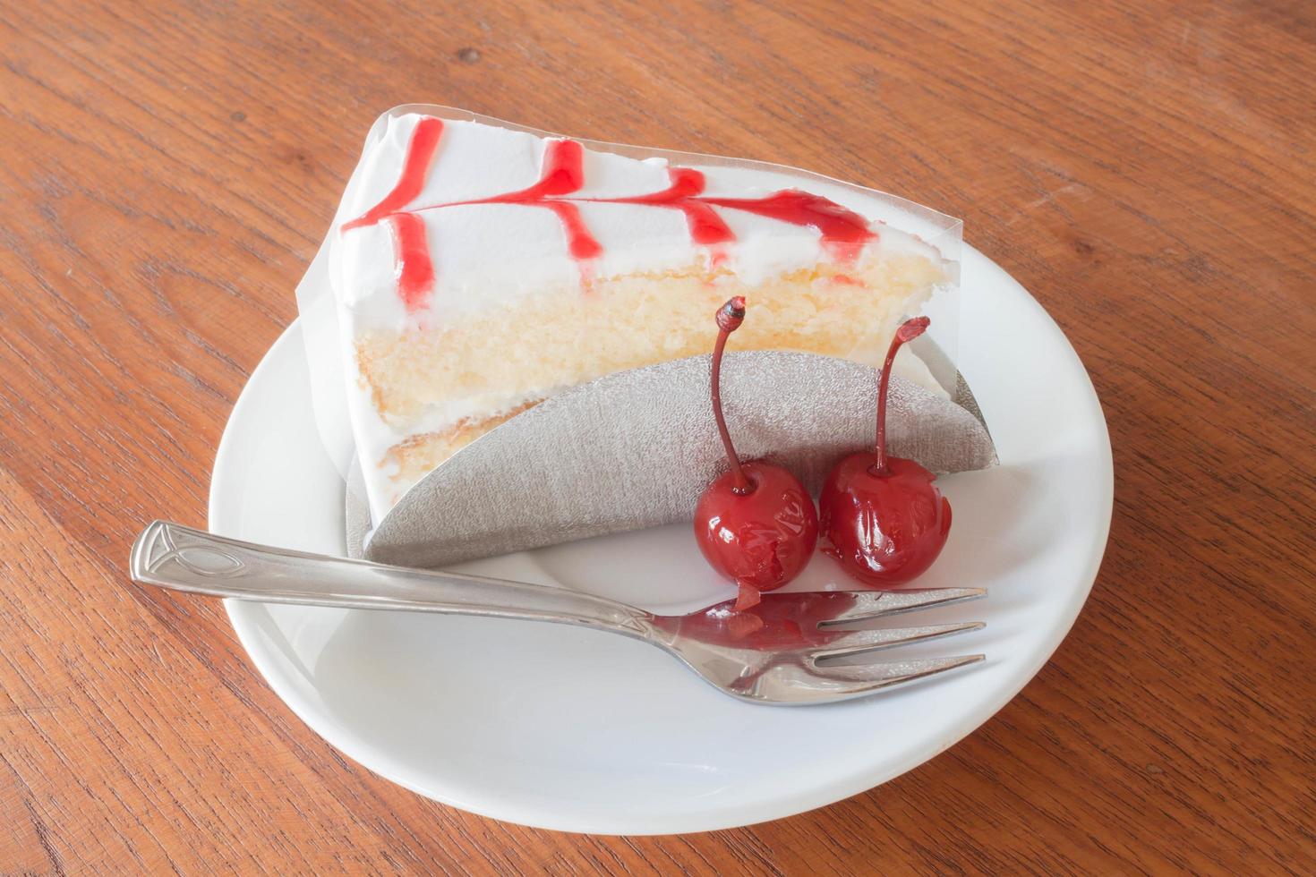 Vanilla and cherry cake photo