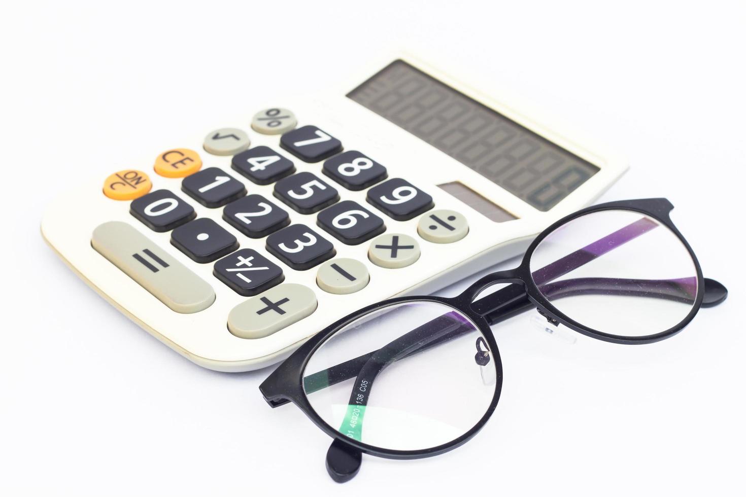 Calculator and eyeglasses photo