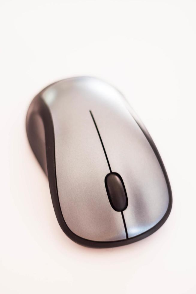 Silver wireless mouse isolated on a white background photo