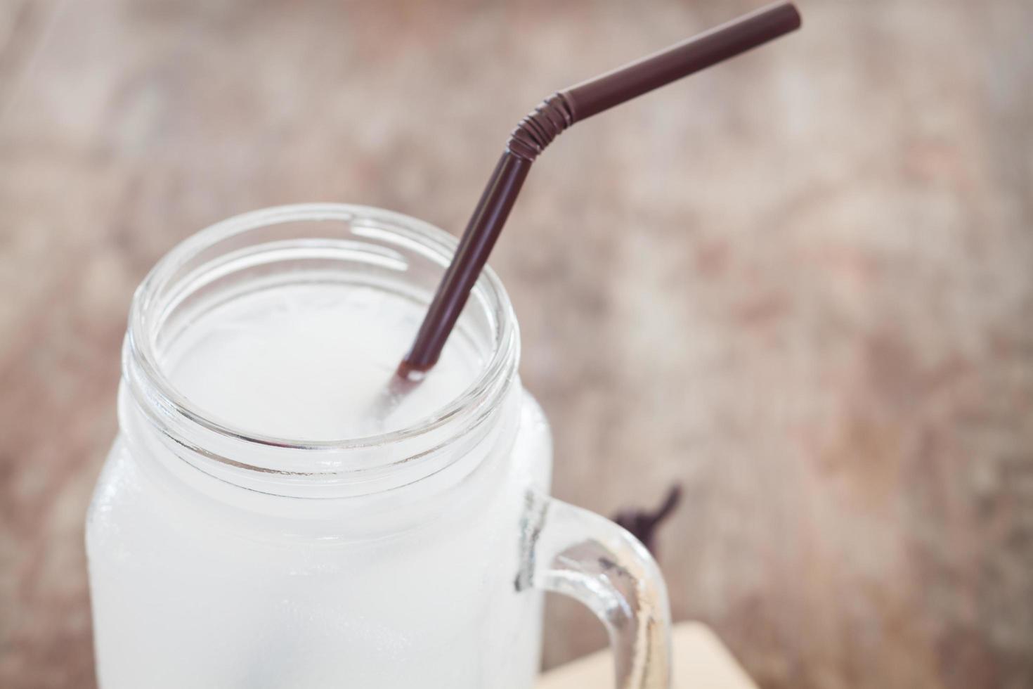 Close-up of a glass of coconut water photo