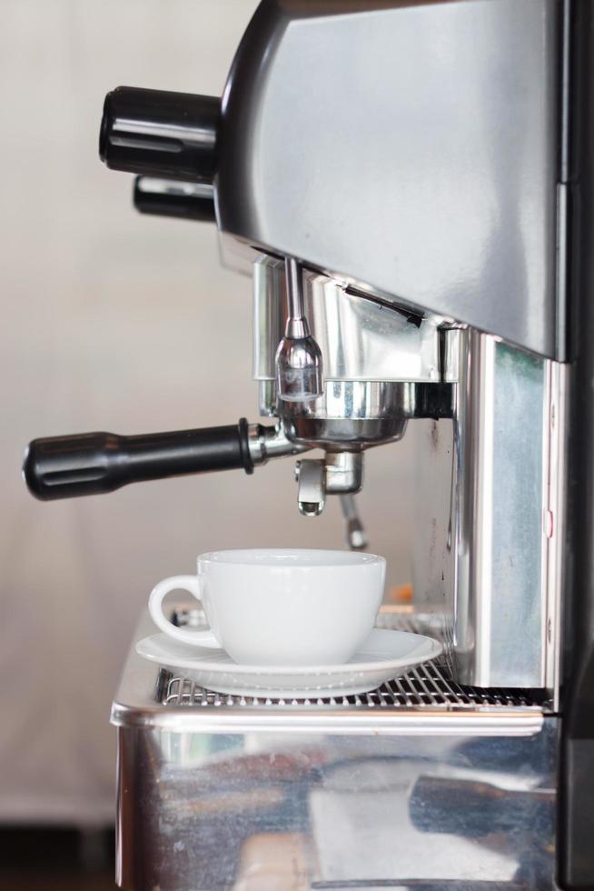 Side view of an espresso machine photo
