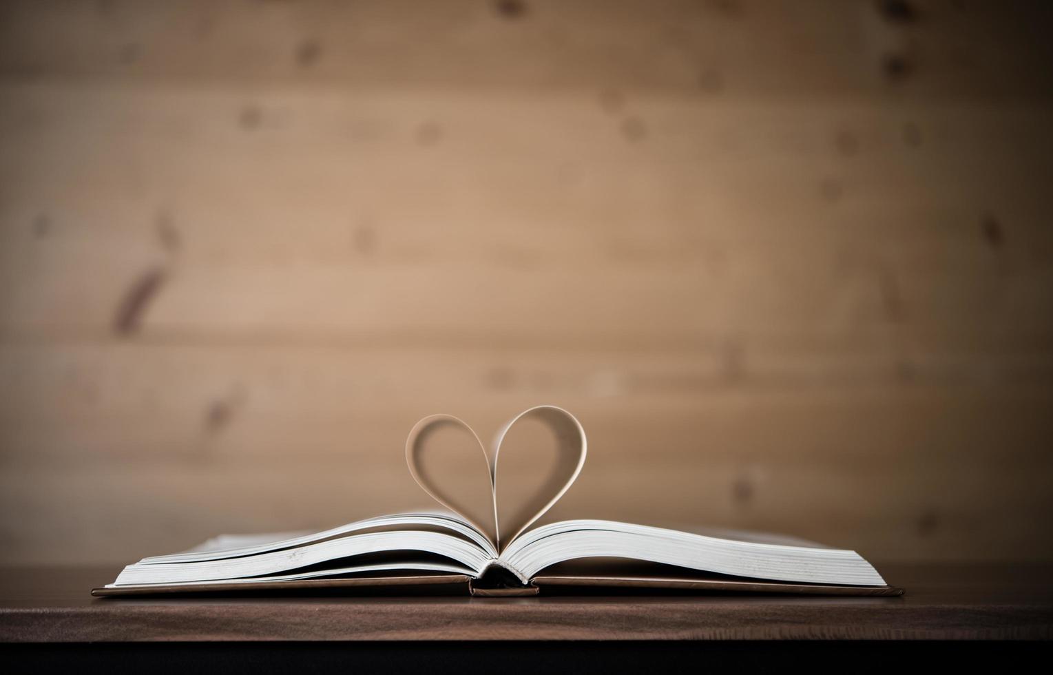 Pages of a book forming the shape of the heart photo