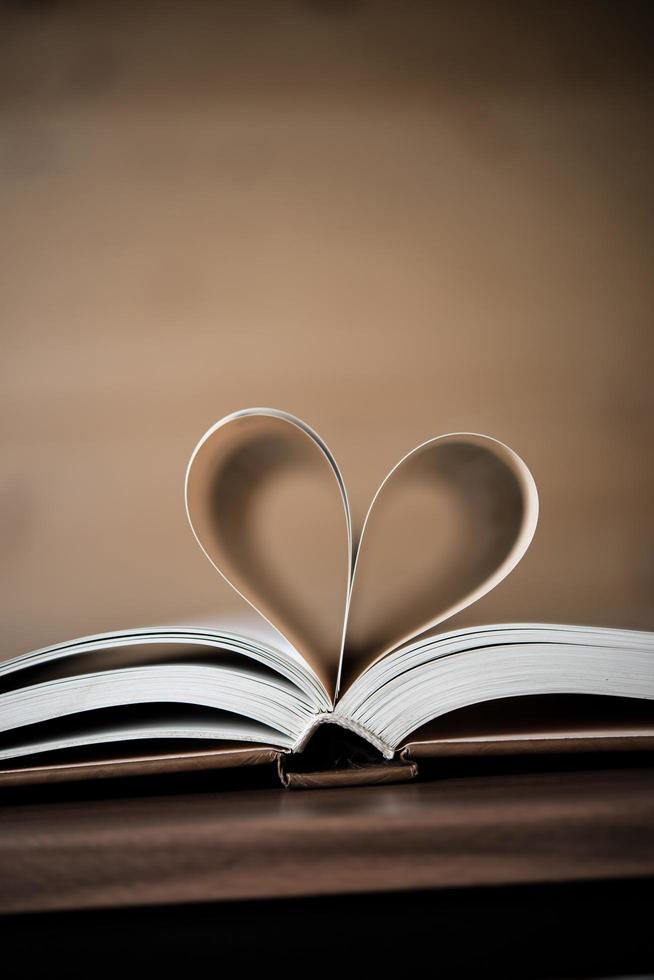 Pages of a book forming the shape of the heart photo