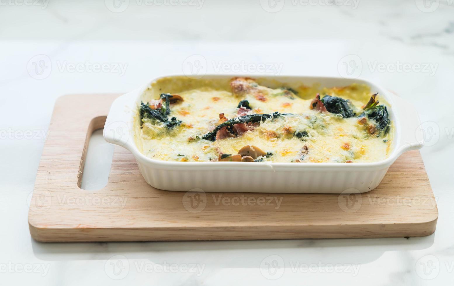 Spinach lasagna in a casserole dish photo