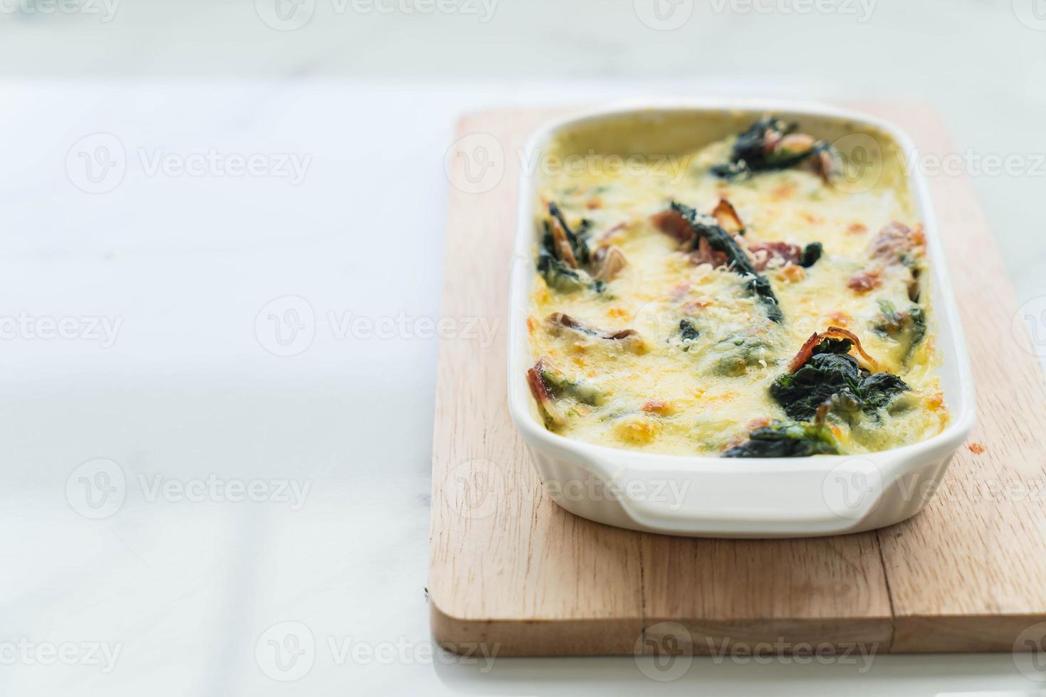 Spinach lasagna in a casserole dish photo