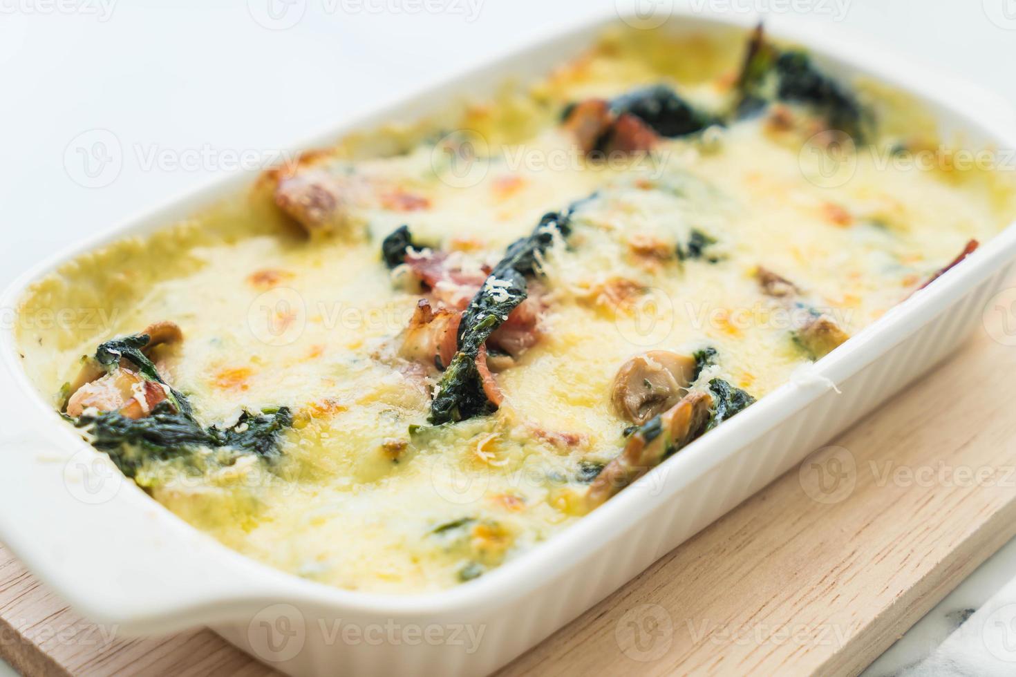 Spinach lasagna in a casserole dish photo