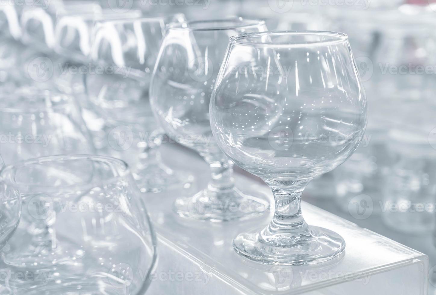 Empty wine glasses in a line photo