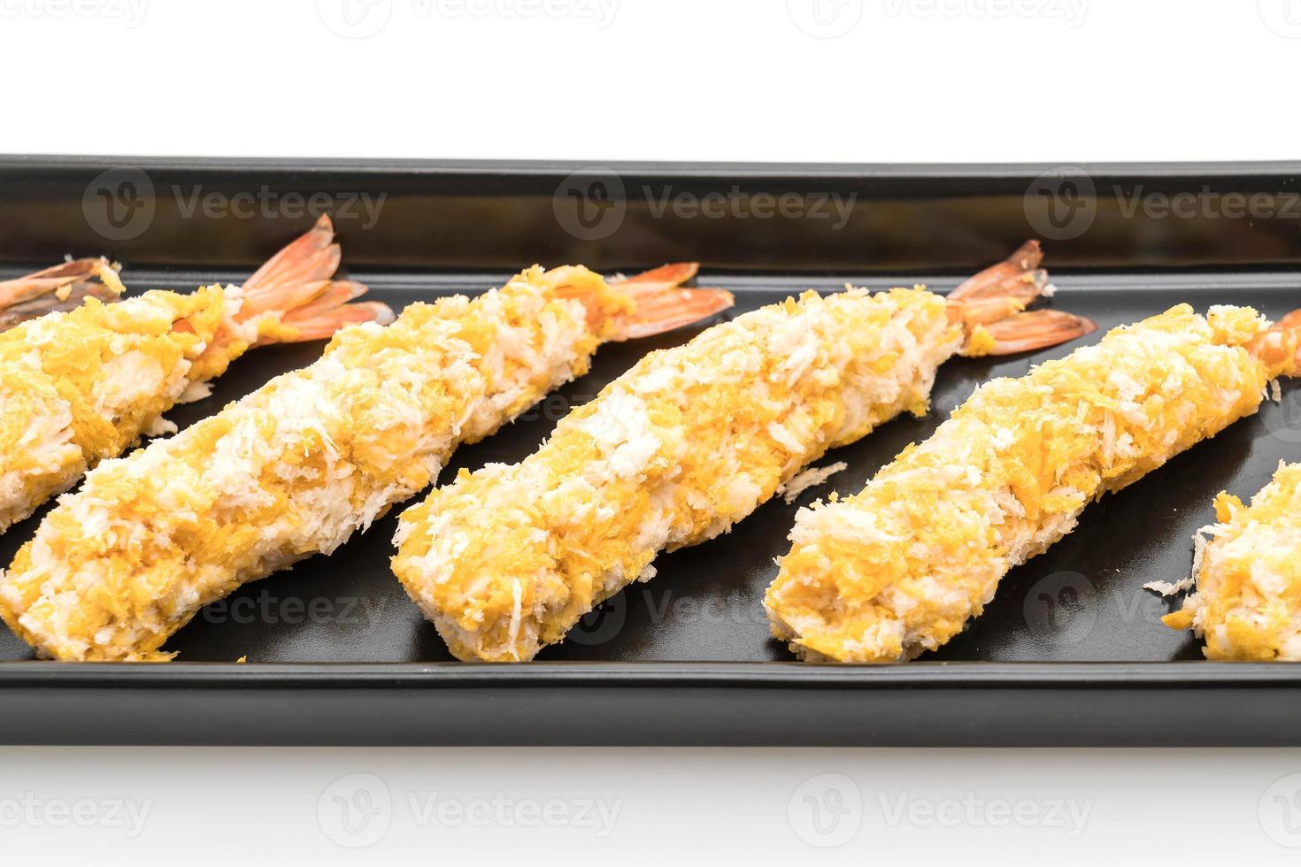 Batter-fried prawns on white background photo