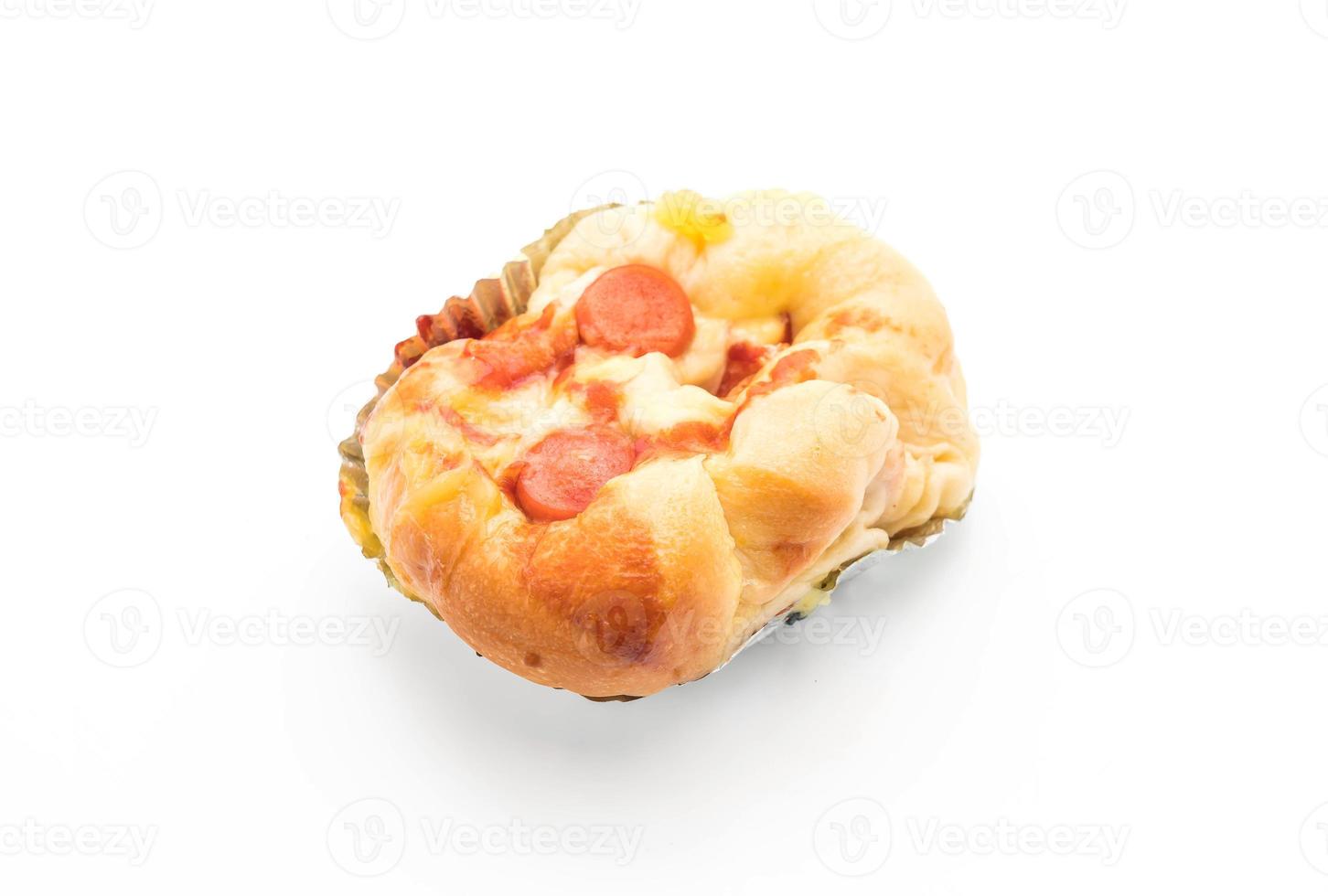 Baked sausage bread on white background photo