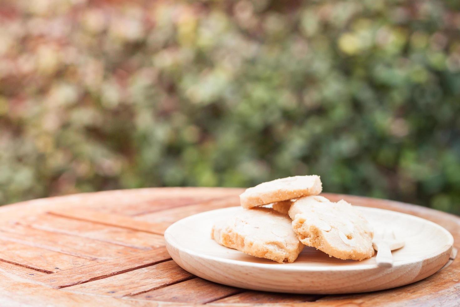 Cashew cookies on a wooden table photo