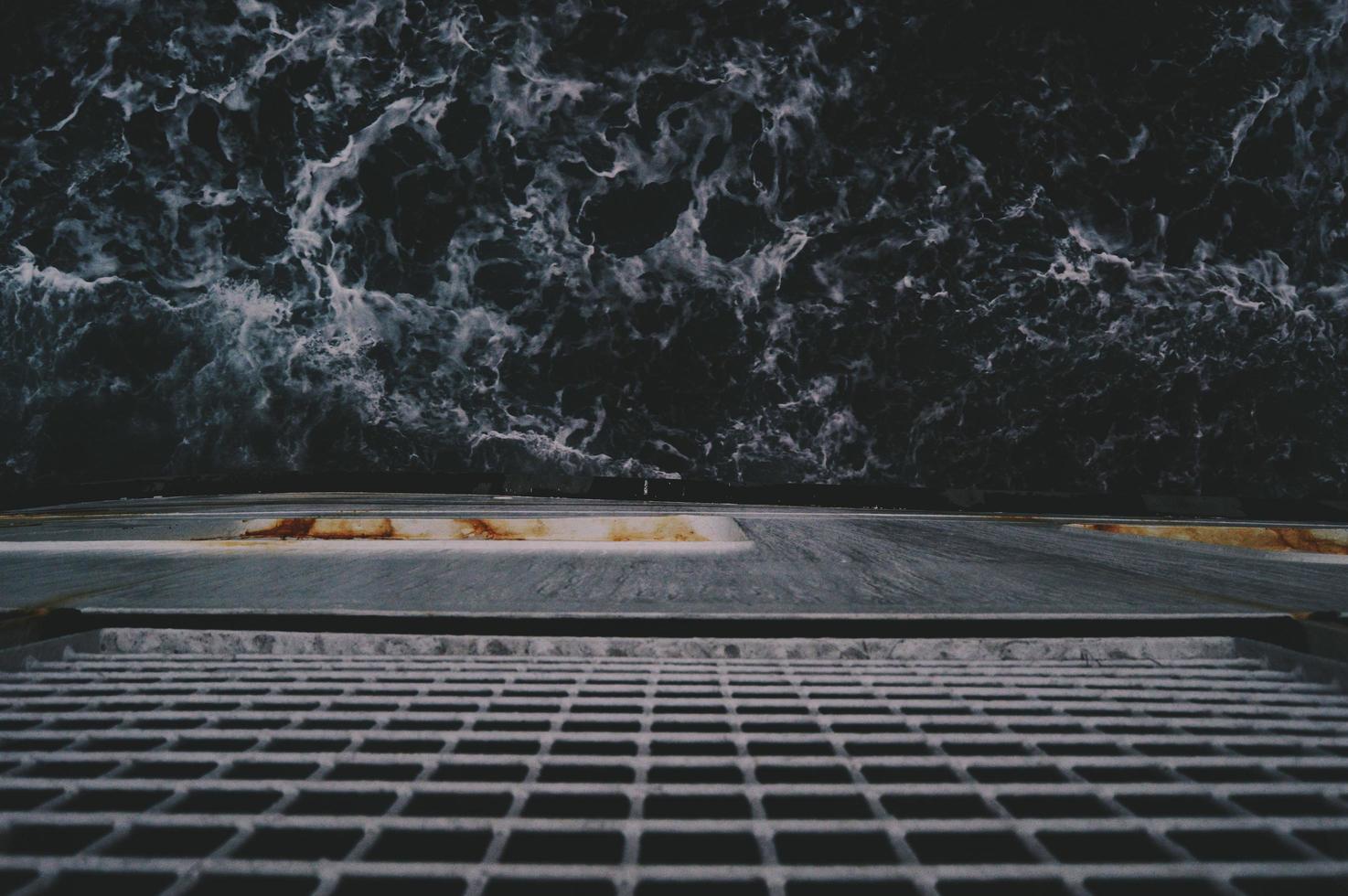 Looking down at the ocean from a ship photo