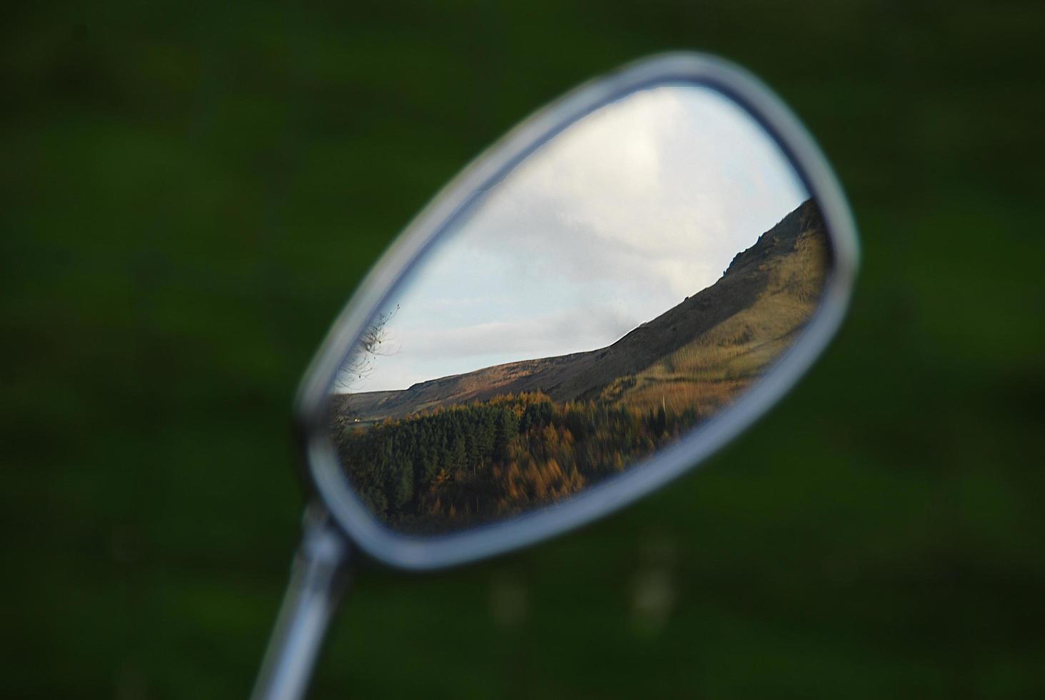 Mountain range in the rear view mirror photo