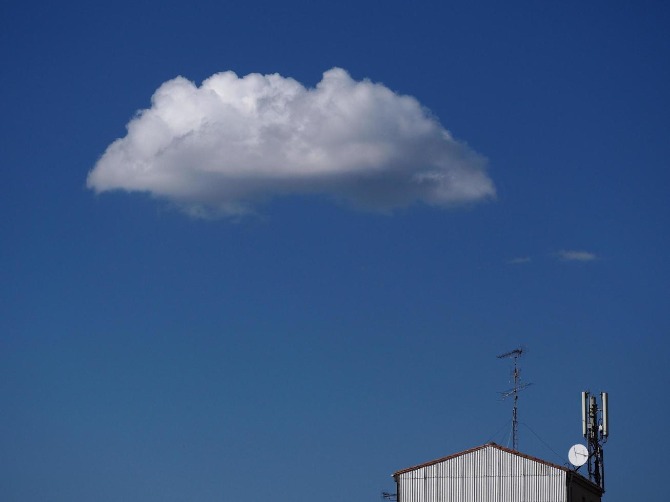 Cloud above a building photo