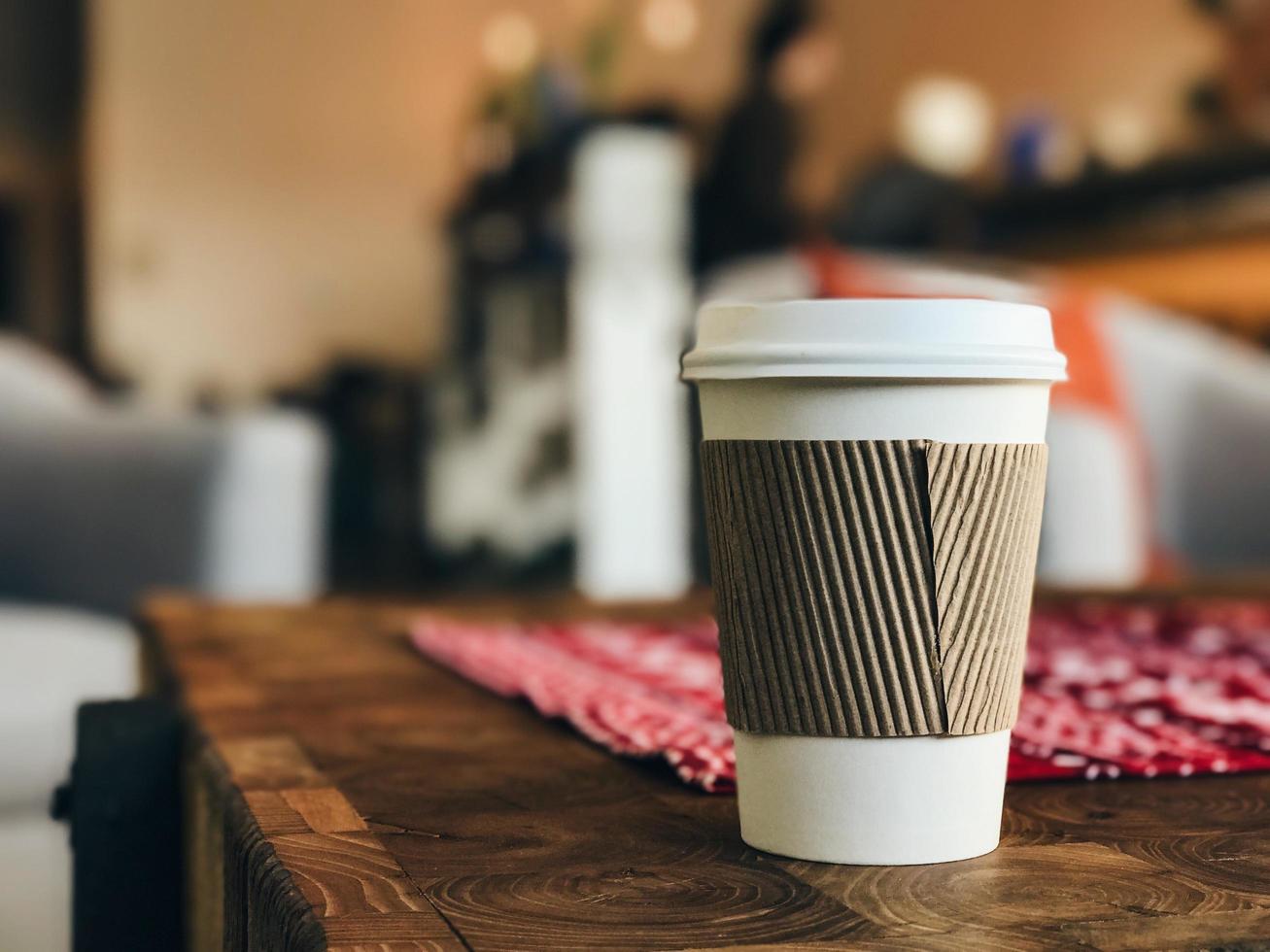 Close-up of a to-go coffee cup photo