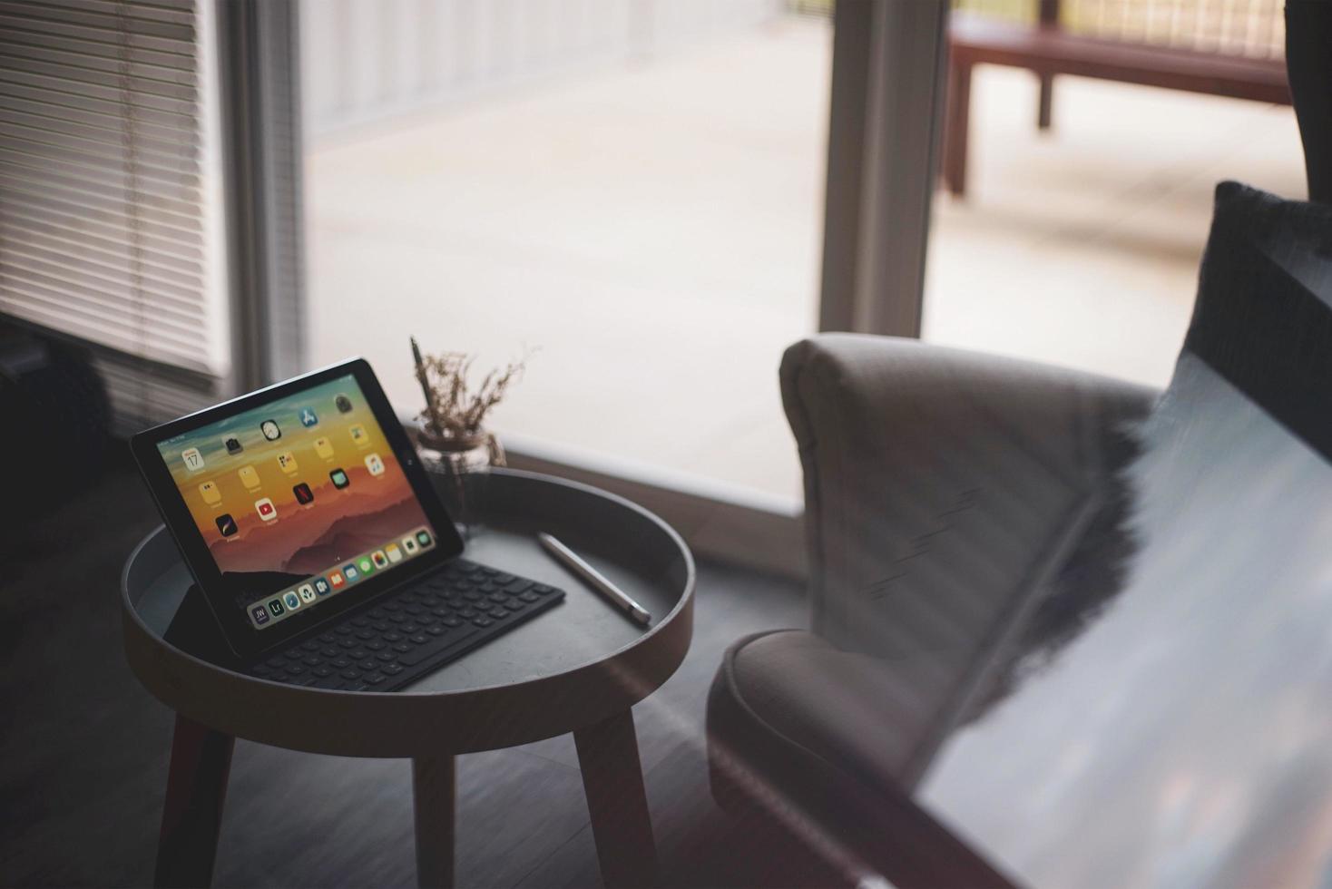 Tablet on a table in a living room photo