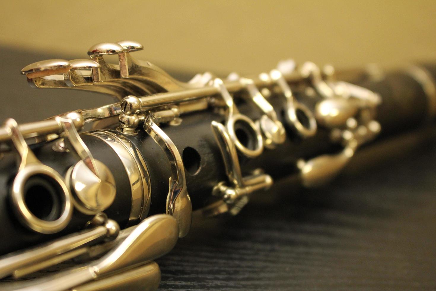 Black clarinet on a black table photo