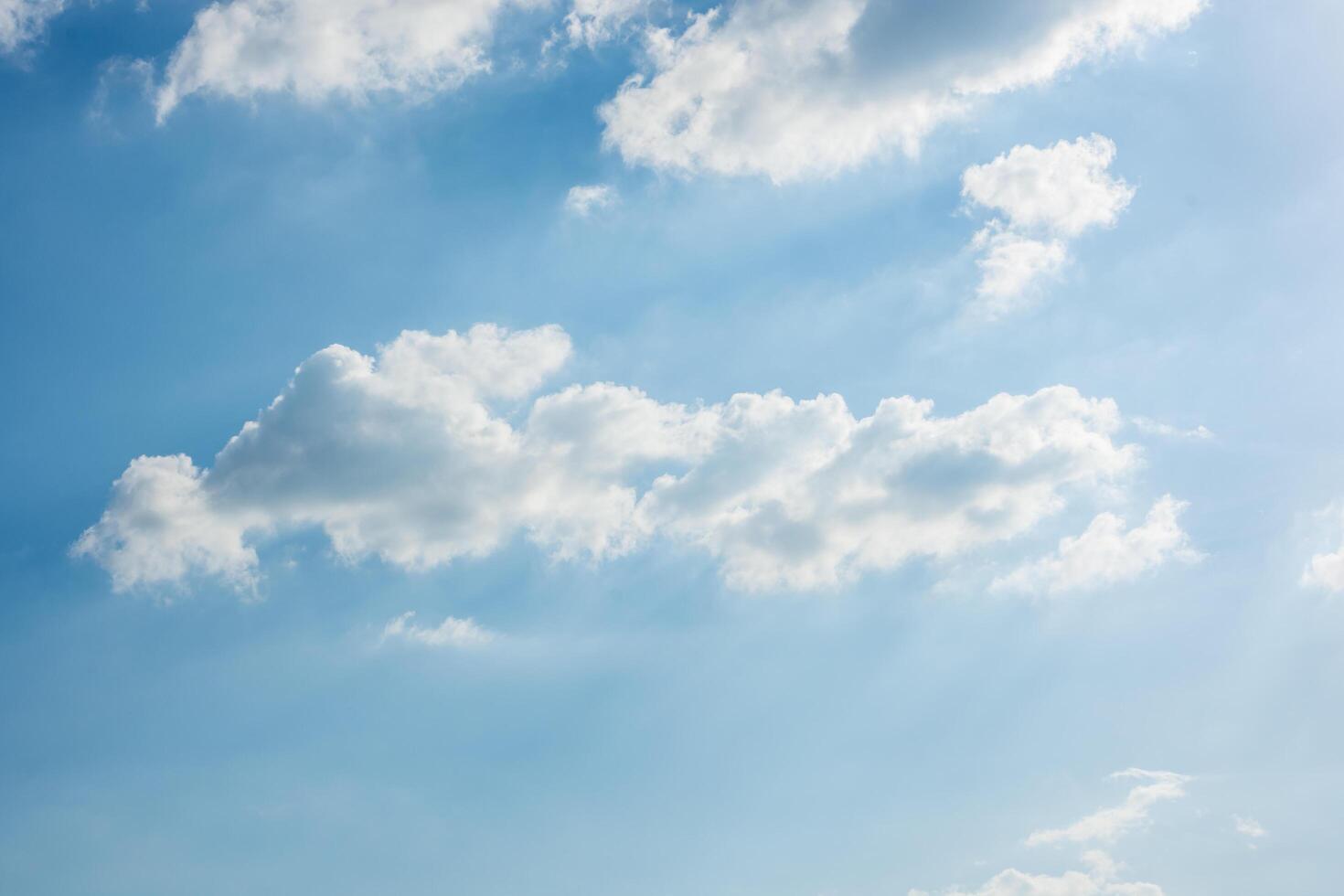 Blue sky with white clouds photo