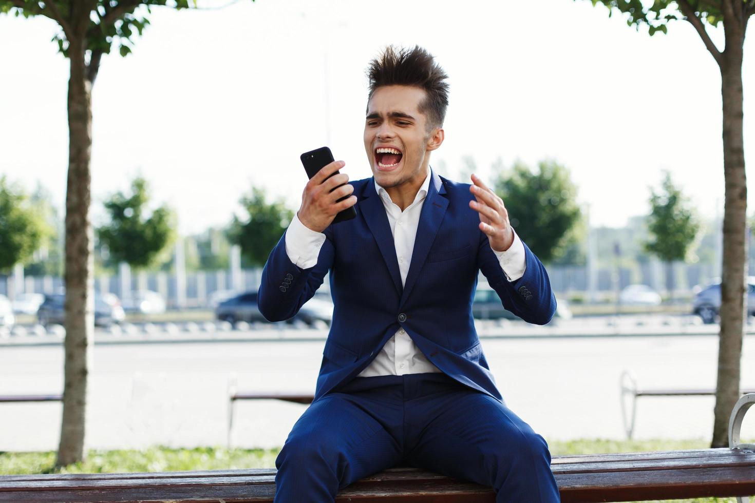 Business man screaming photo