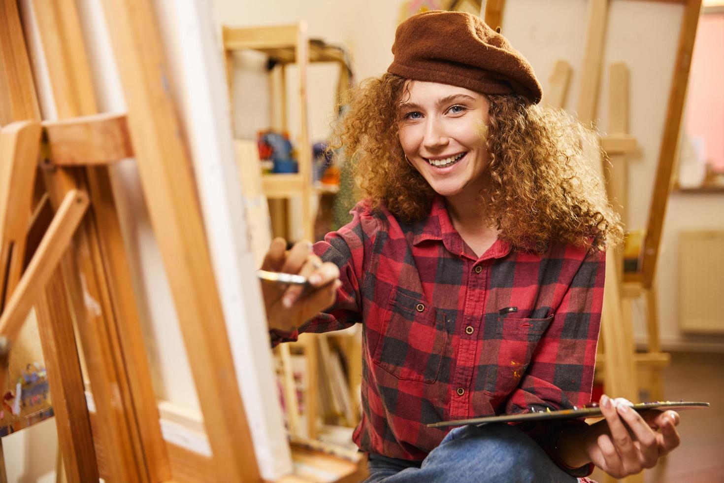 Smiling artist wearing a beret photo
