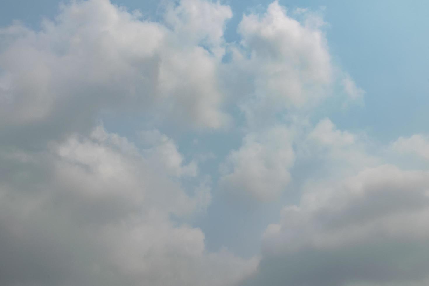 Blue sky with white clouds photo