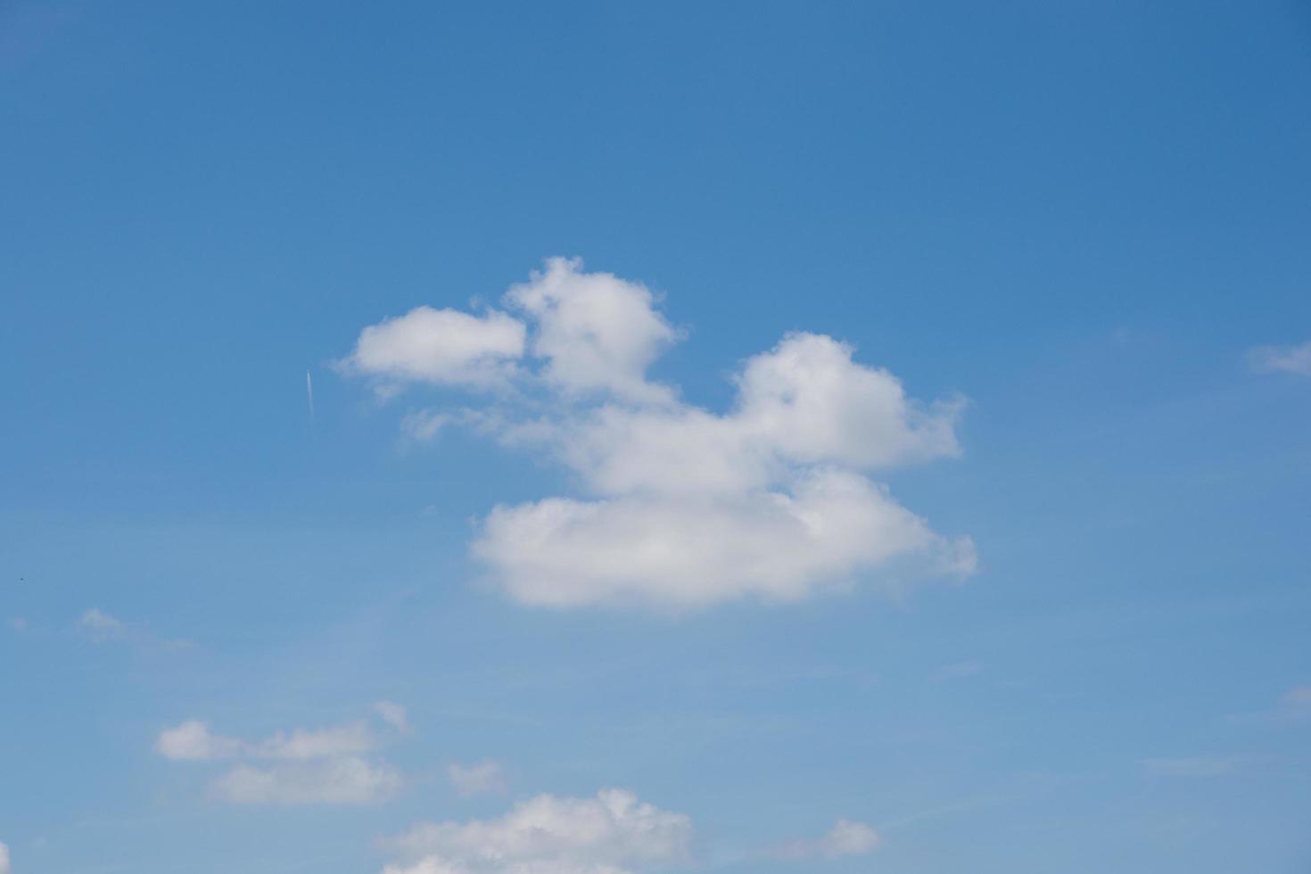 Blue sky with white clouds photo