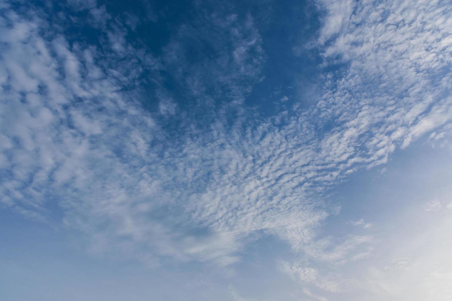 Blue sky with white clouds photo