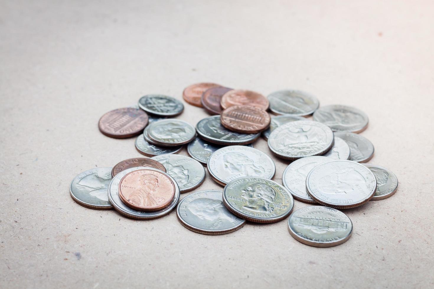 Pile of coins on a white background photo