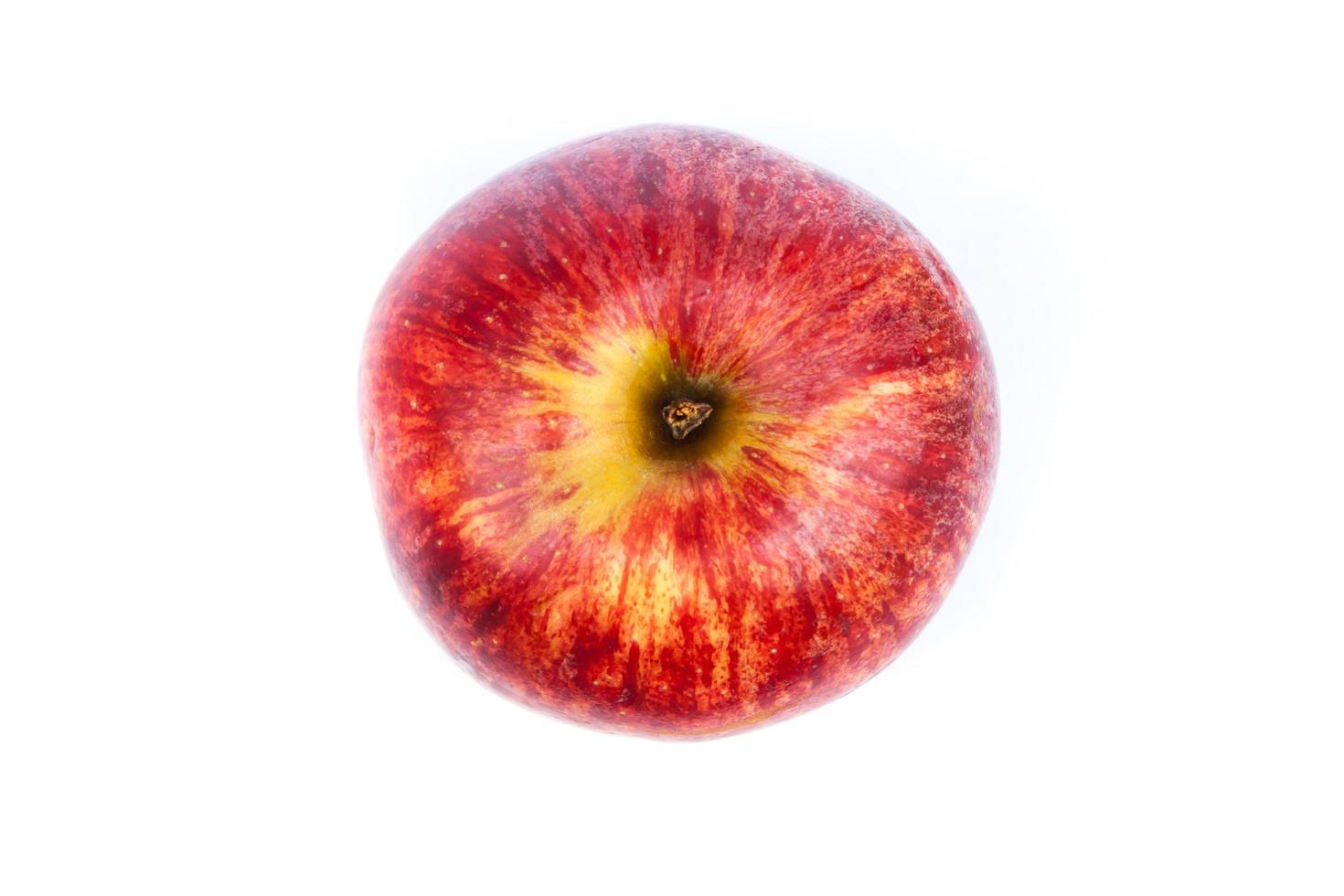 Top view of a red apple on a white background photo