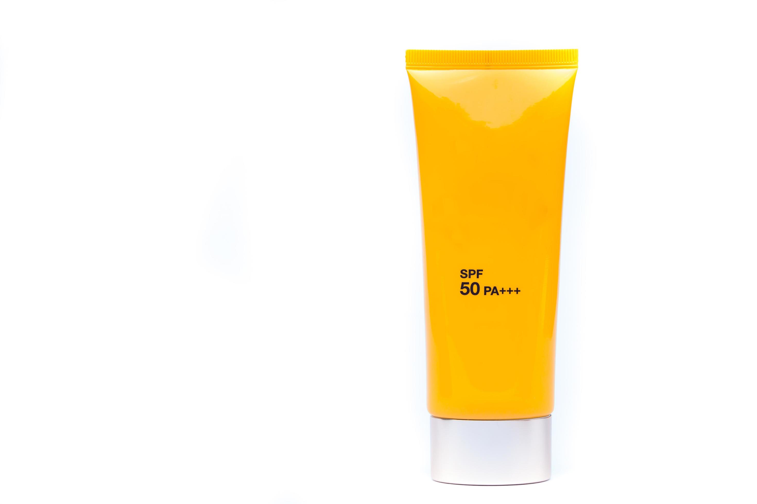 Yellow bottle of sunscreen 1826660 Stock Photo at Vecteezy